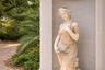 Imported marble statues throughout the grounds.