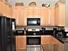 Pleany of cabinet space in the kitchen.