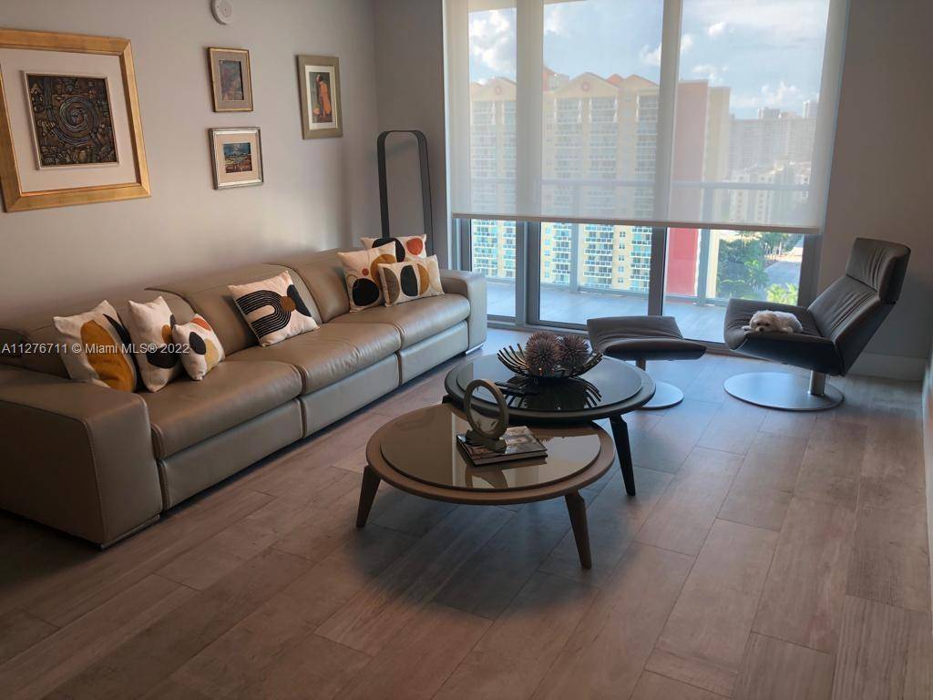 Come enjoy this spectacular and spacious two bedroom, three bathroom residence in Parque Tower, conveniently located in the center of Sunny Isles, just steps from the beach.