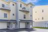 Rare end-unit townhome with water views and direct beach access just steps away.