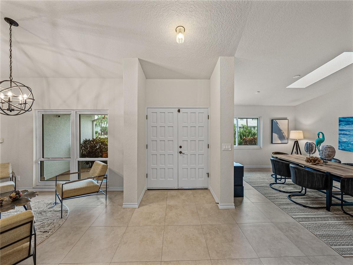 The 8' double doors make for a lovely entrance. Not the impact resistant windows!