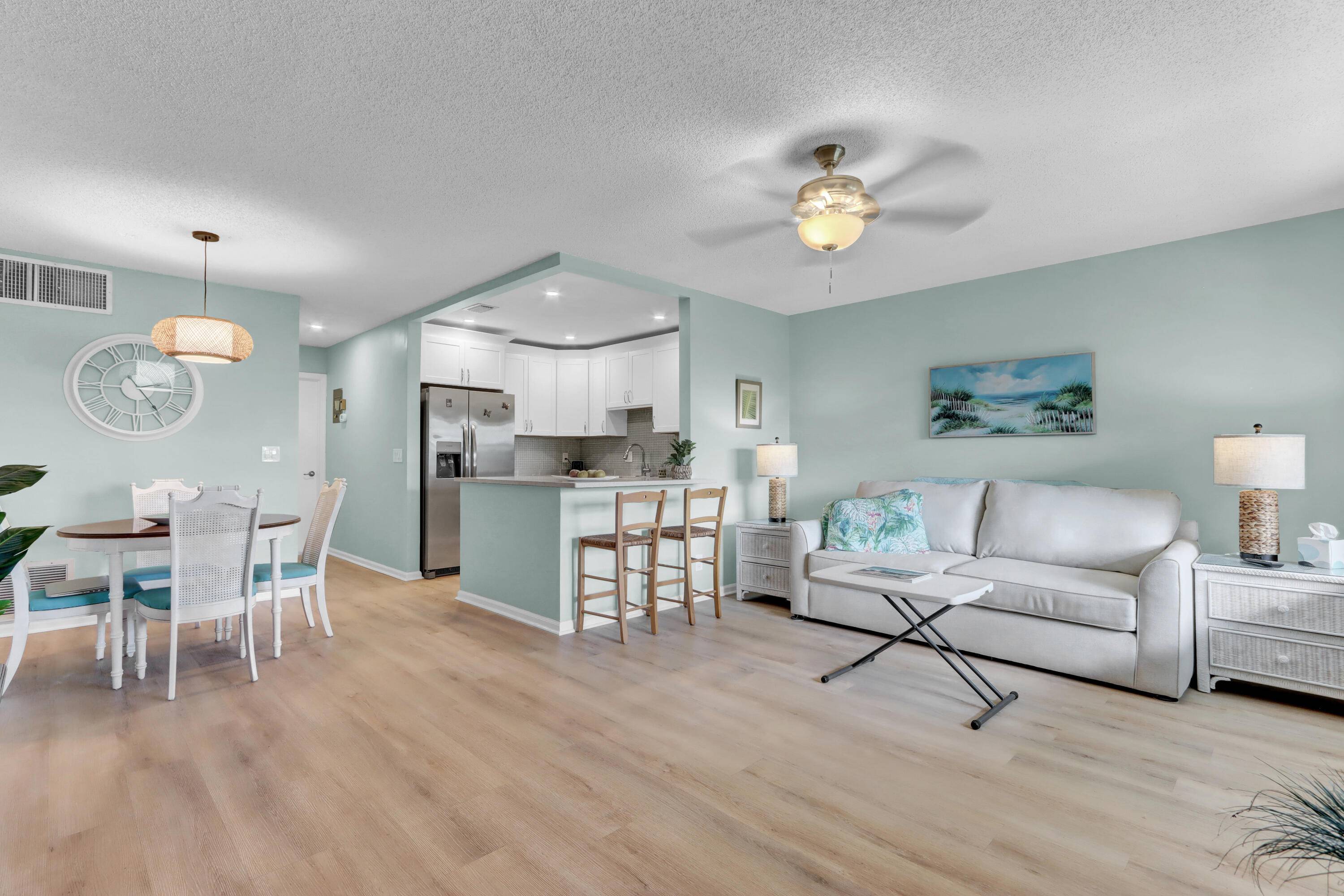 COMMUNITY FOR ALL AGES IMMEDIATE RENTAL AVAILABILITY Discover the Fairway Condo showcasing a stunning NEW kitchen seamlessly connecting to the spacious living and dining areas !