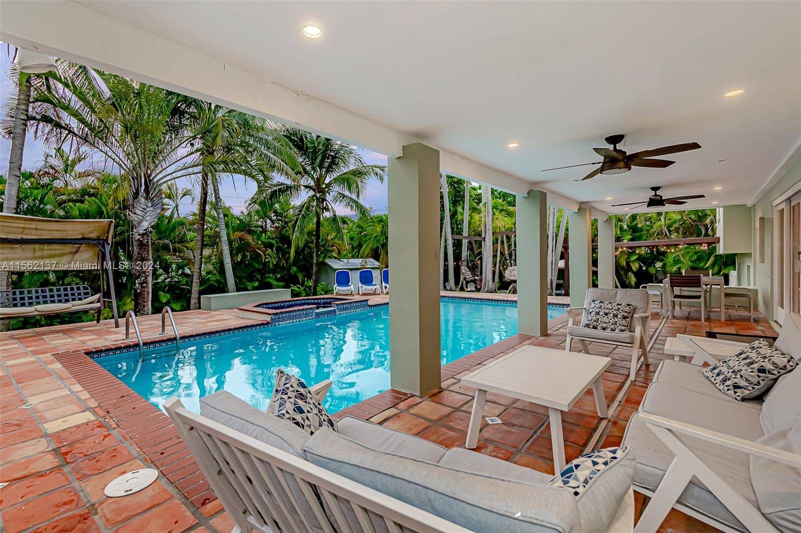 This stunning Pinecrest home has been exquisitely updated and is move in ready.