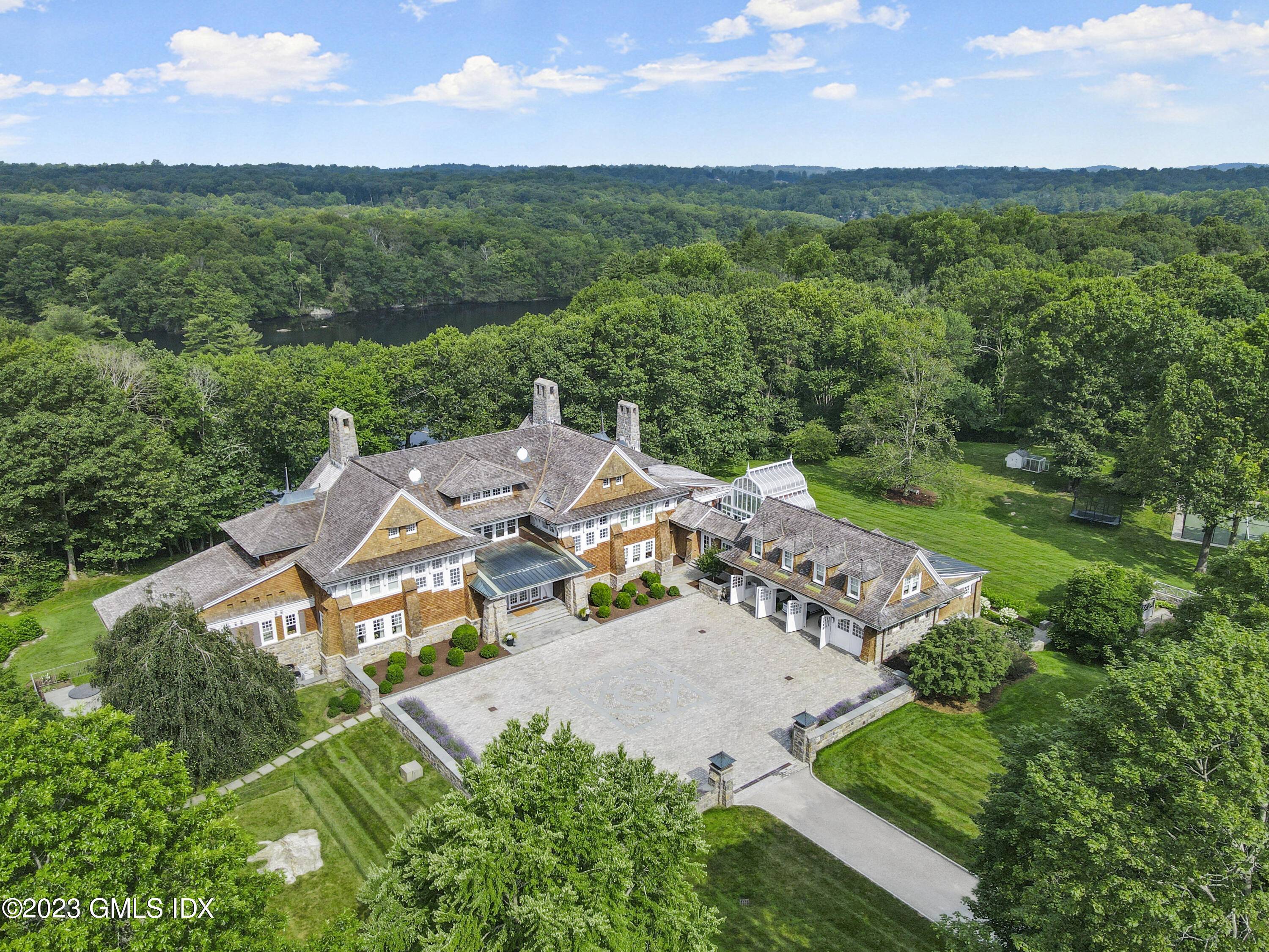 Spectacular Converse Lake direct waterfront estate in coveted Conyers Farm Association.