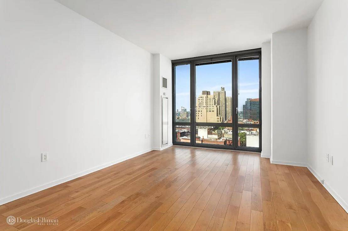 Bright and beautiful, West facing 1 Bedroom at The Link with floor to ceiling windows, large kitchen with pass through, and stainless steel appliances.