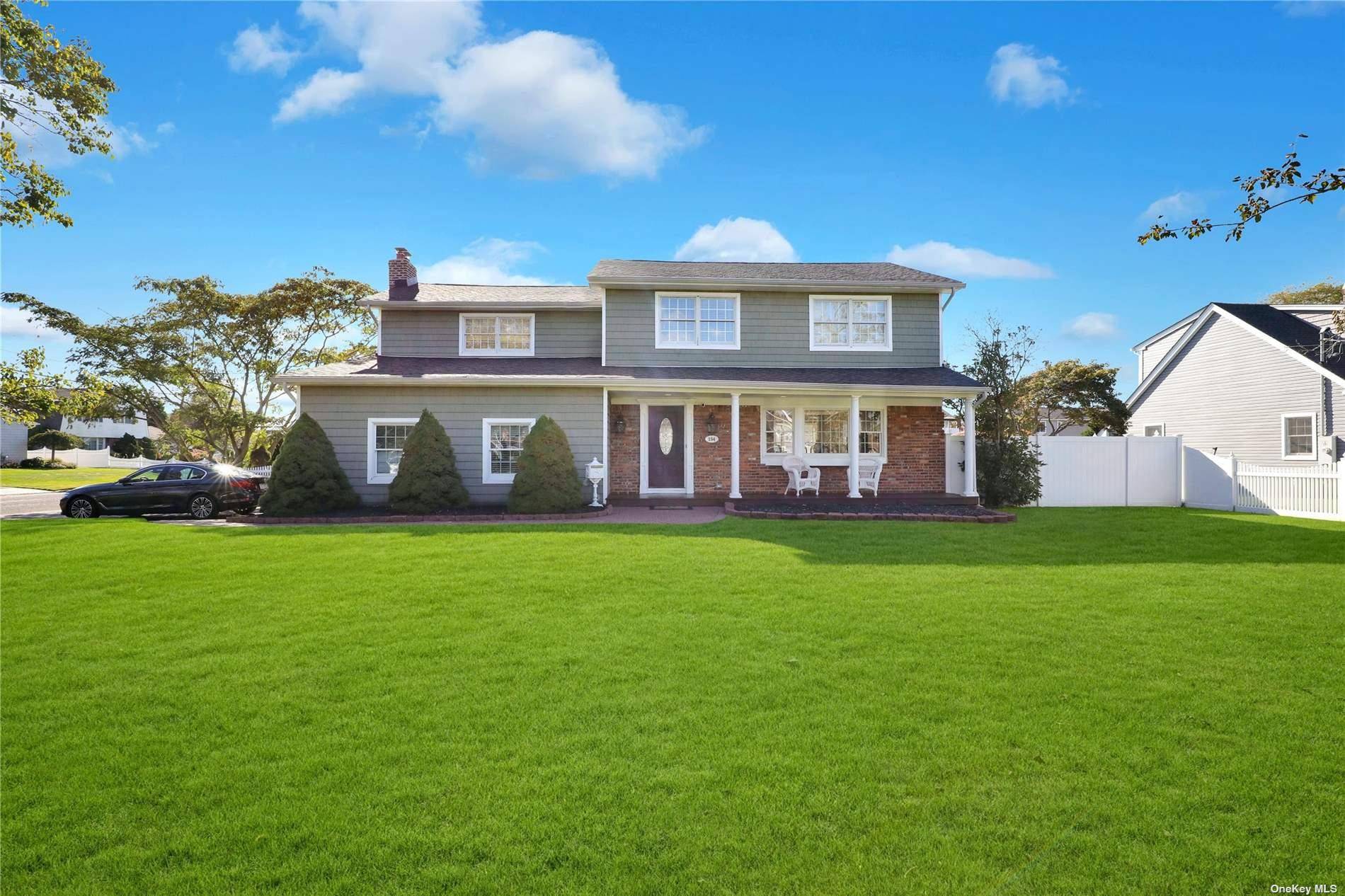 Welcome to beautiful South Sayville Colonial with spectacular views of the water and only 15 minutes away from Fire Island.