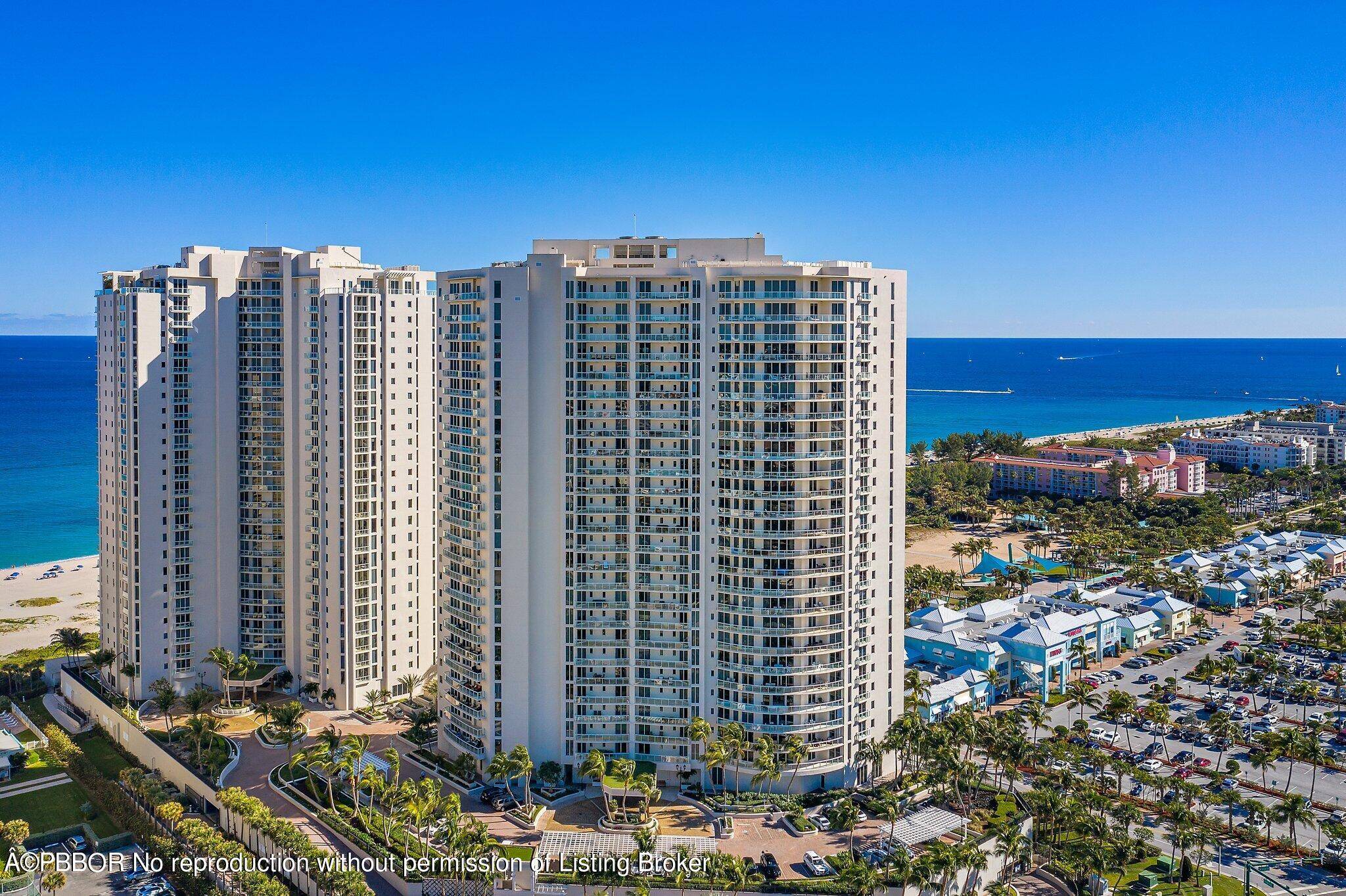 Steps from the beach, this Lower Penthouse Ritz Carlton Residence is beautifully renovated, with 2 private balconies, den bonus room and wet bar.