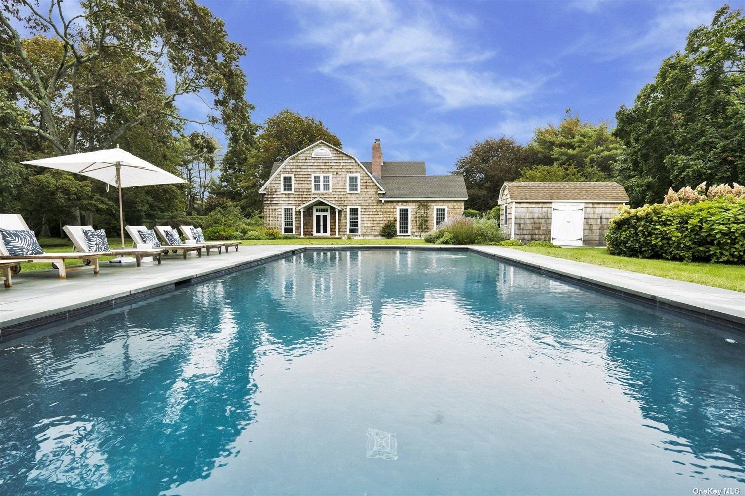 GORGEOUS QUOGUE TRADITIONAL Magnificent 4 BR 5 BA home in the Estate section of Quogue with plenty of living space.