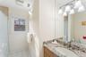 Bathroom featuring vanity and a shower with shower curtain