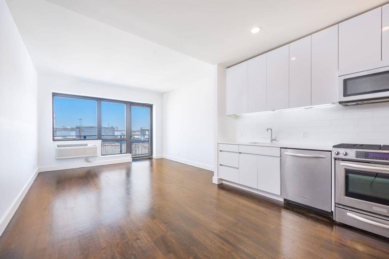 This perfectly laid out condo studio has a private terrace, over sized windows and a private rooftop cabana.