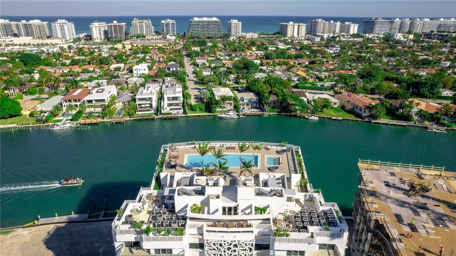 RARE OPPORTUNITY ! Luxury fully furnished unit with partial water view in the sophisticated Bay Harbor Islands.