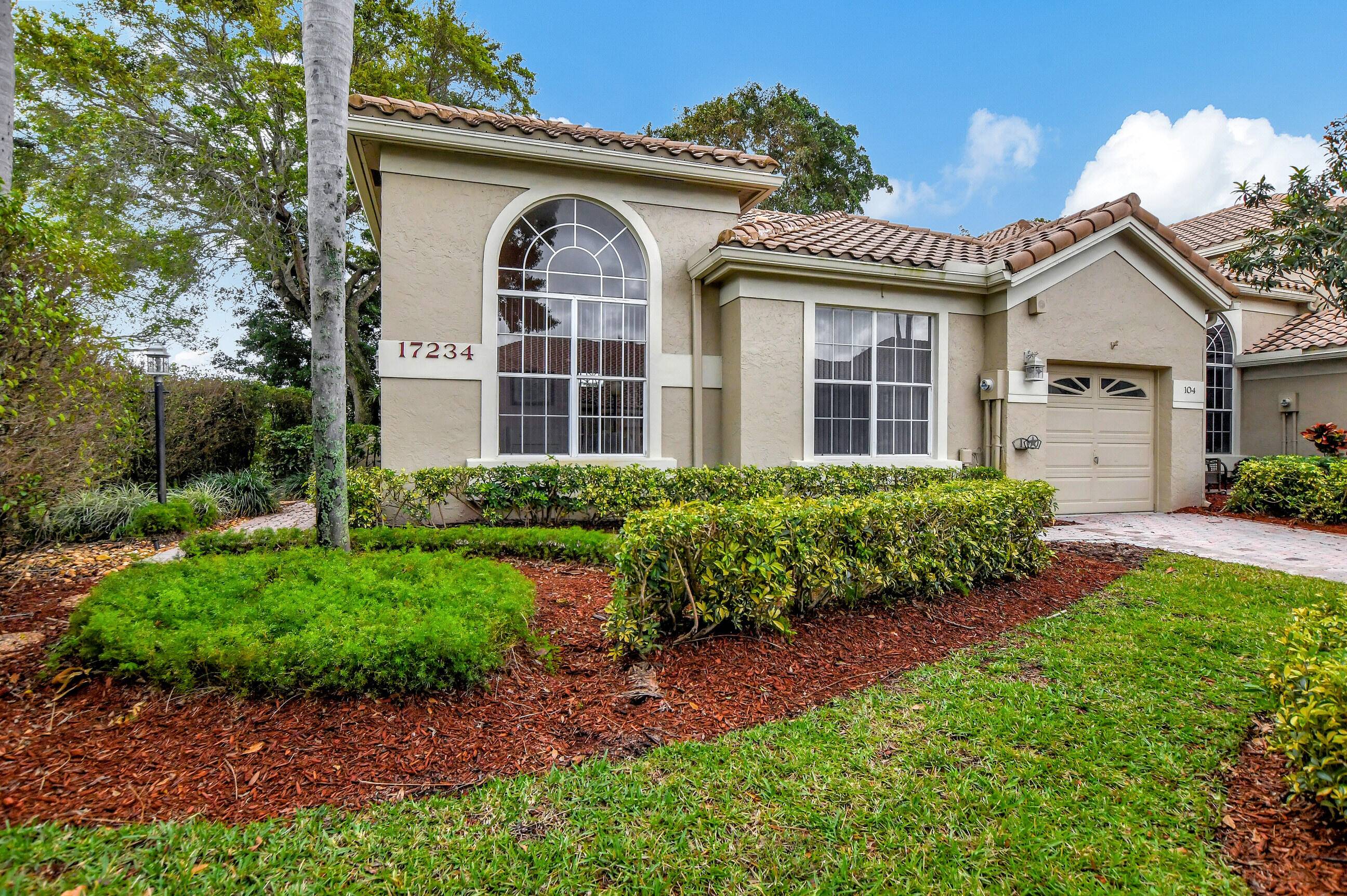 Welcome home to this Desirable Townhouse located in Prestigious Boca Golf and tennis !