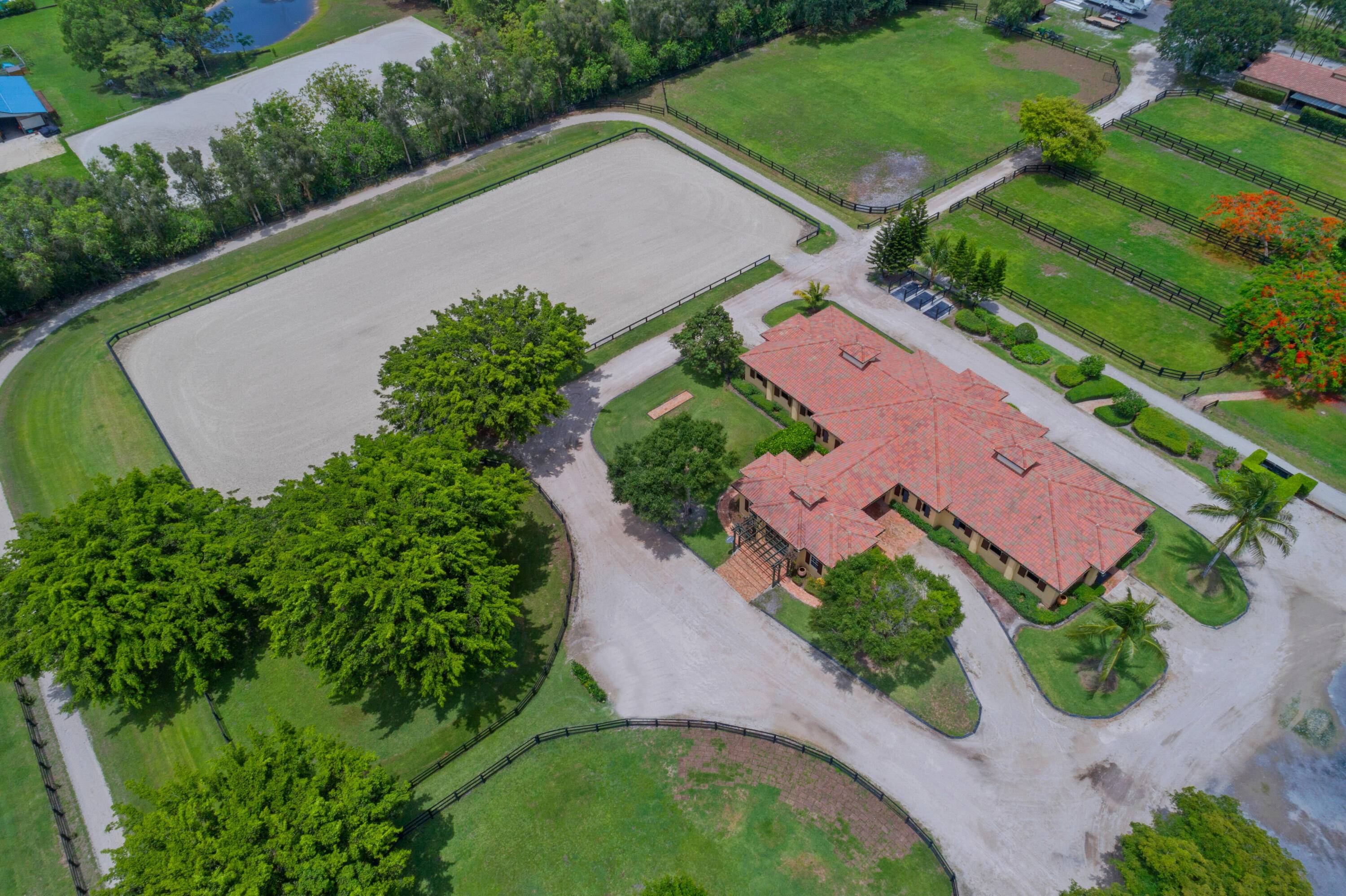 World class equestrian estate located in the South End of Wellington just minutes from Palm Beach International Equestrian Center.
