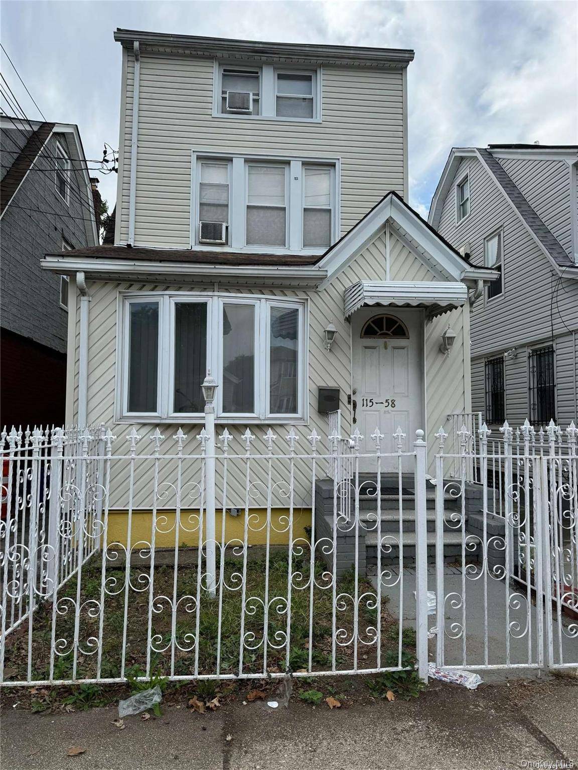 2 family short sale property subject to third party approval, 2 or 3 bedrooms over 1 bedroom, walk up attic, finished basement with walk out access.