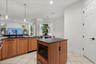 Extra cabinets and a cubby for your microwave to be hidden