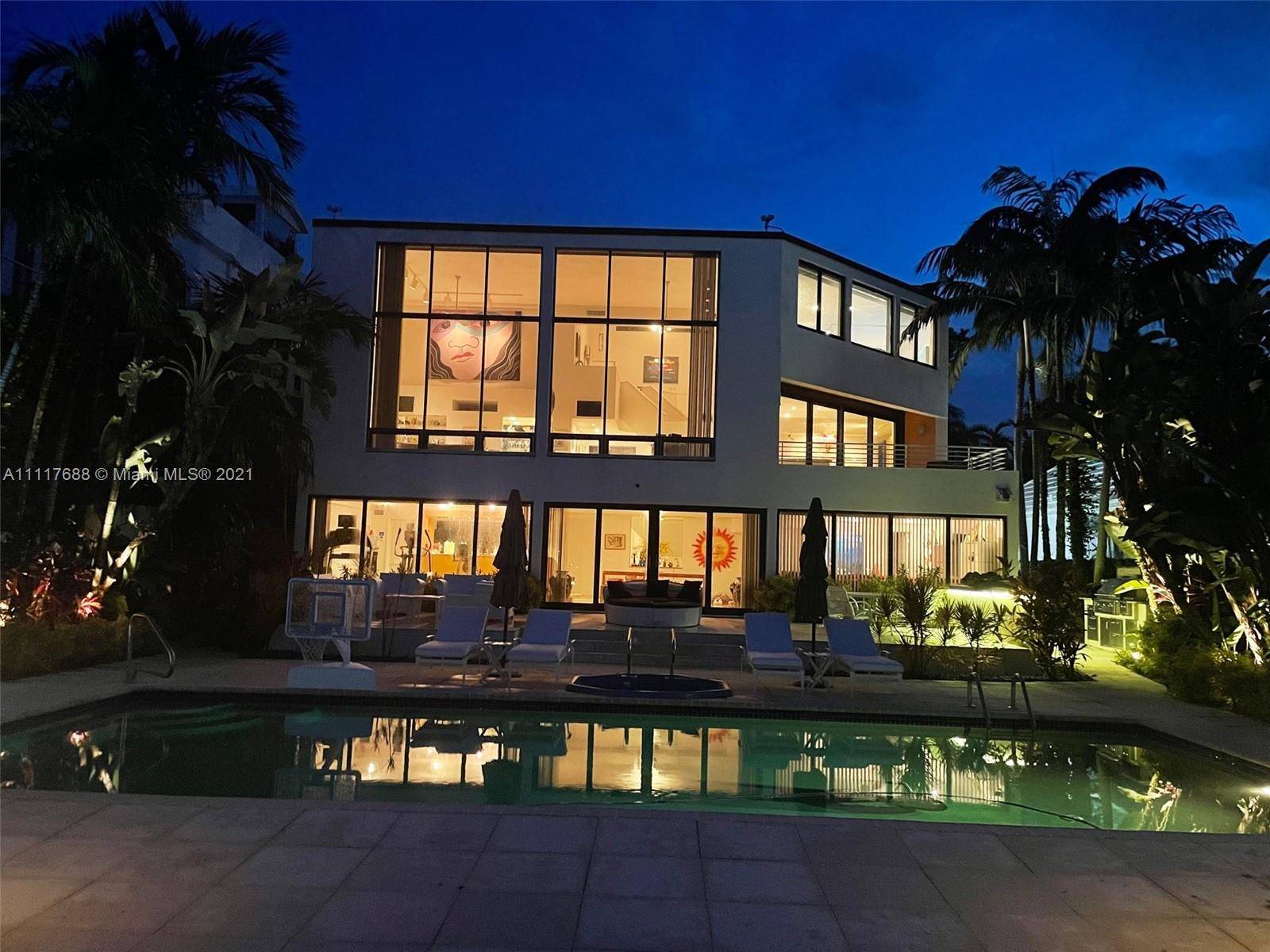 A dramatic custom built architect s waterfront 3 story timeless custom gem featured on Miami Vice and in the Miami Herald.