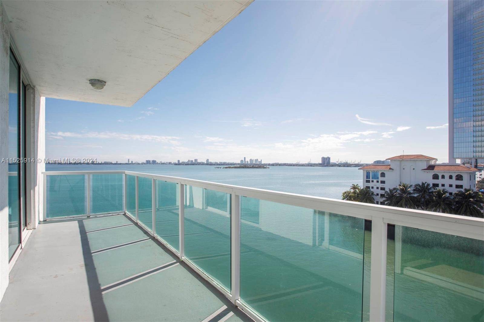 Immerse yourself in luxury with this spectacular SE corner 2 bedroom, 2 bathroom residence featuring panoramic bay views and a spacious balcony.