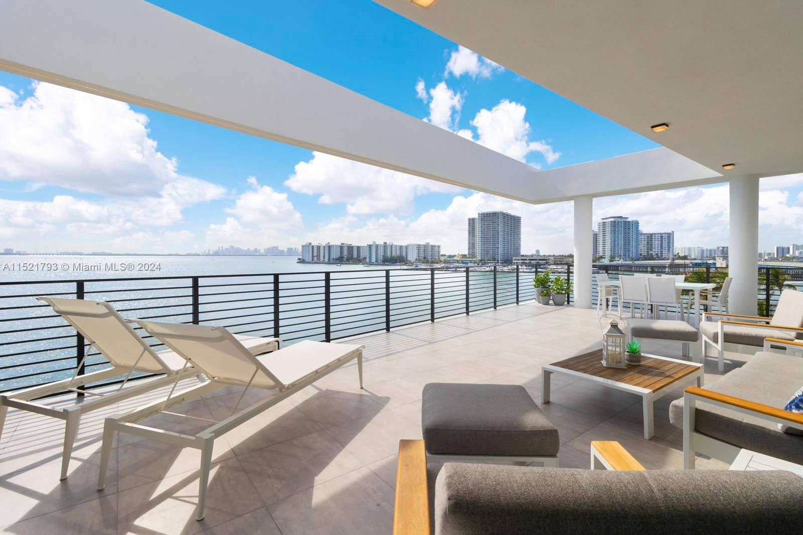 This opulent penthouse offers an unparalleled waterfront lifestyle, boasting a private boat dock and awe inspiring panoramic views of the bay.