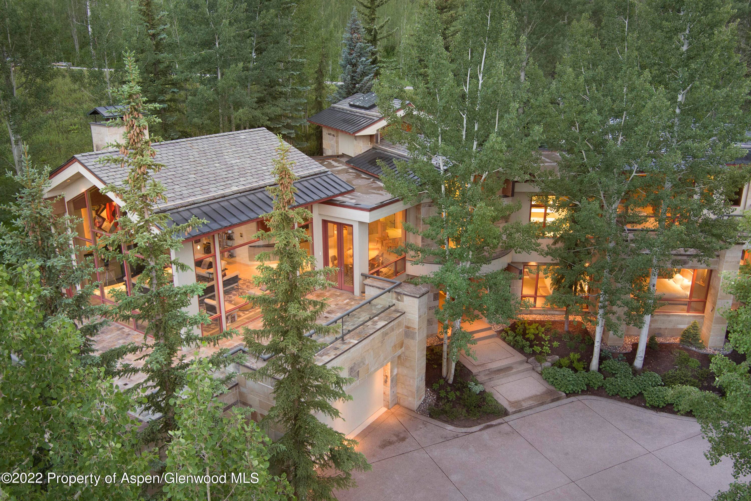 Ski directly from Dawdler ski run into this stunning contemporary home located in the prestigious Divide subdivision.