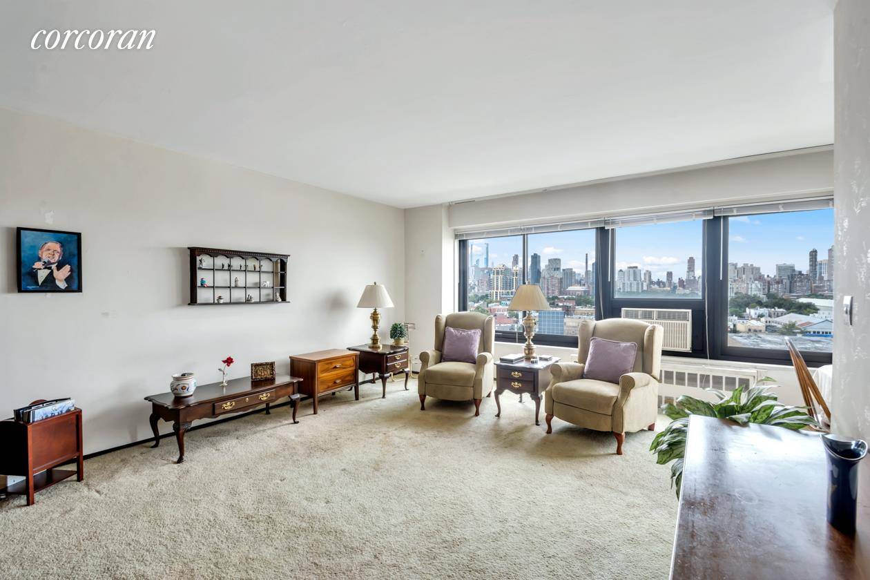 Bright and spacious two bedroom home with open, western exposures of Manhattan skyline and East River.