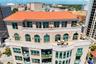 Aerial showing wraparound top floor penthouse balcony