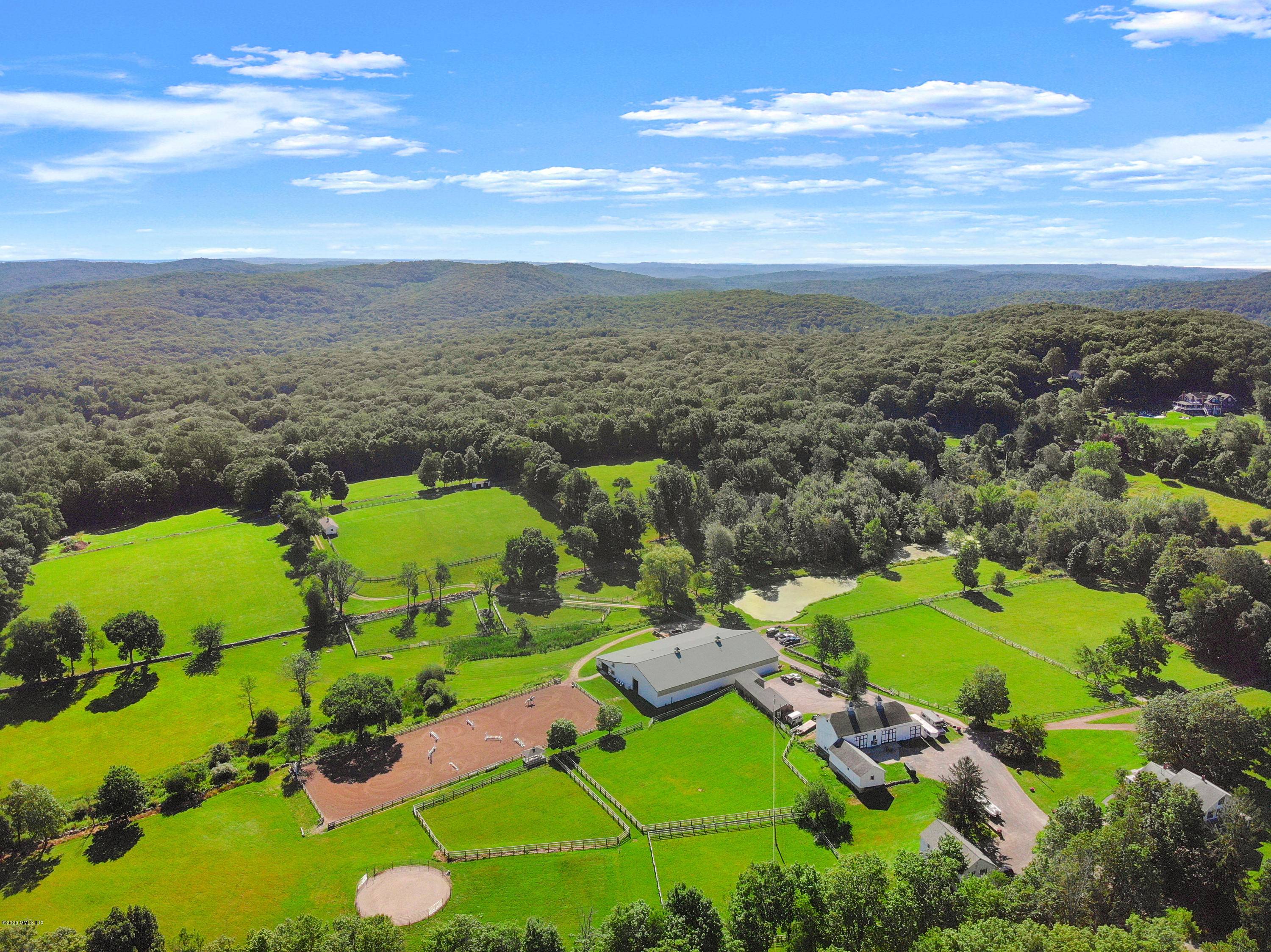 Amid the pastoral beauty of historic Ridgefield's great estates, Turnabout Farm is an equestrian compound gracing 56 picturesque acres of sweeping lawns, meadows, large paddocks and extensive riding trails with ...