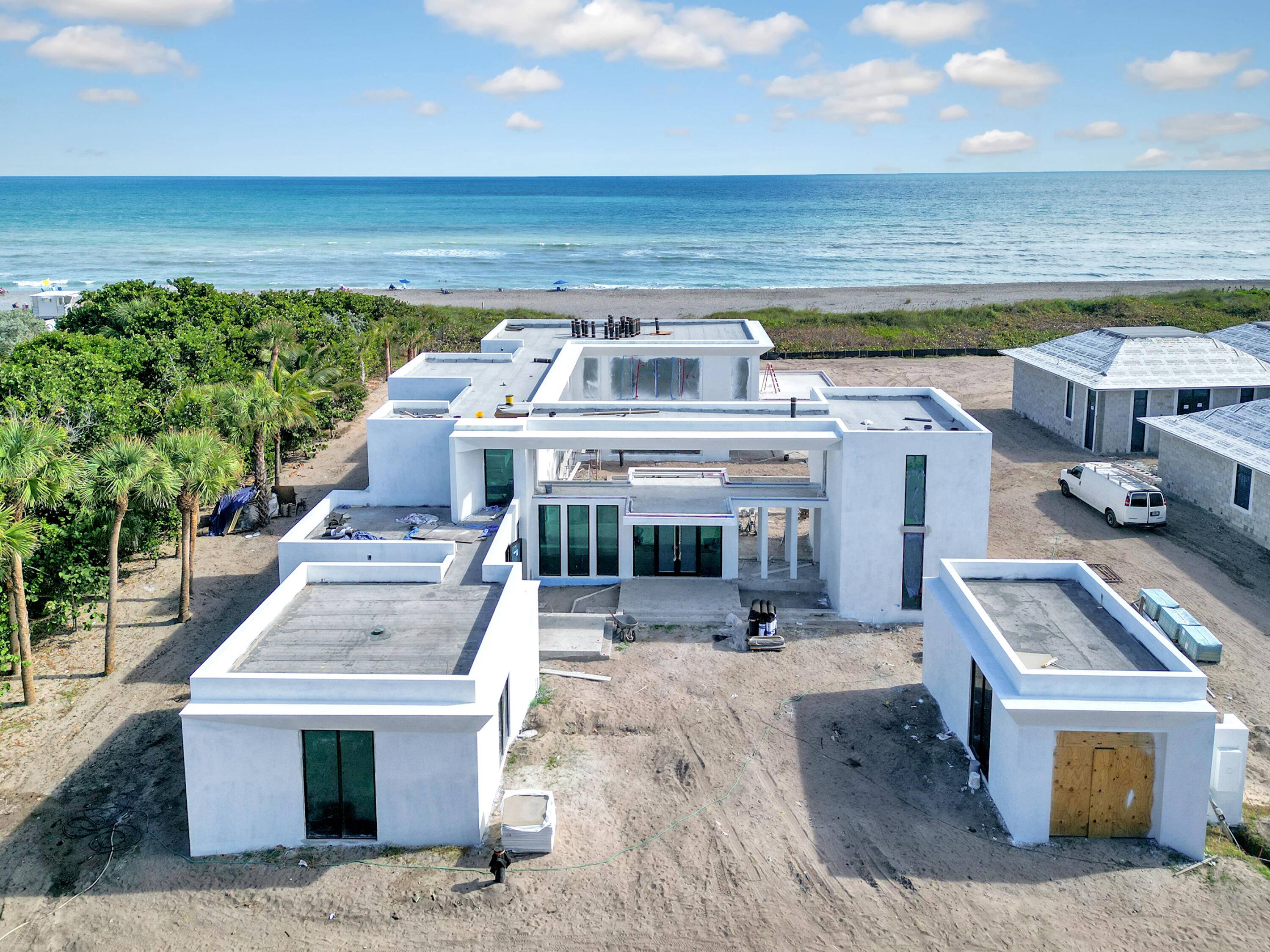 Experience the breathtaking beauty of brand new beachfront construction right on Jupiter Island !