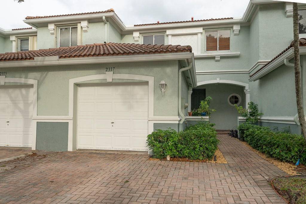 Discover the perfect blend of comfort and style at 2317 Center Stone Lane, Riviera Beach, FL.