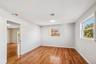 Second floor 4th Bedroom hardwood floors and natural light