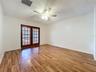 Primary Suite with french doors to lanai