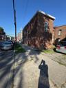 View of side of property with brick siding