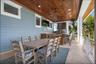 Mid level back porch with outdoor kitchen