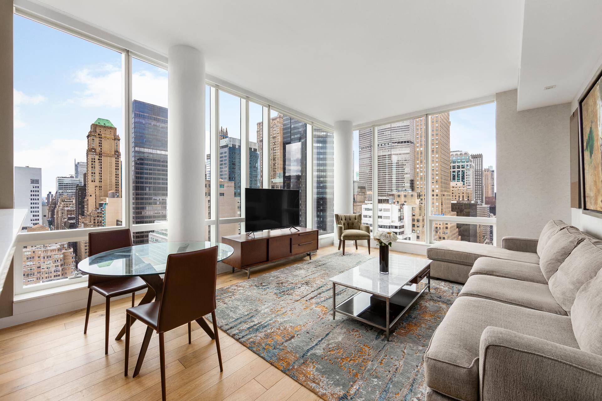 This beautiful two bedroom residence encompasses the entire Western side of the building providing fantastic light, sunset, and open city views.