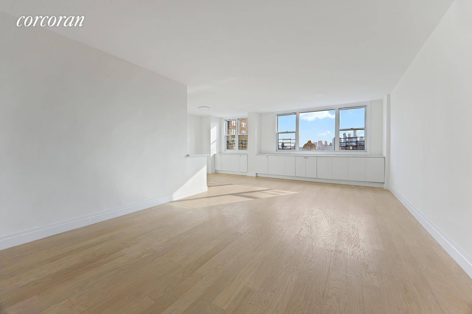 Enjoy the sweeping views of the West Village, the Empire State Building, the Freedom Tower, The Husdon River from this renovated, two bedroom, two bath apartment on the charming and ...