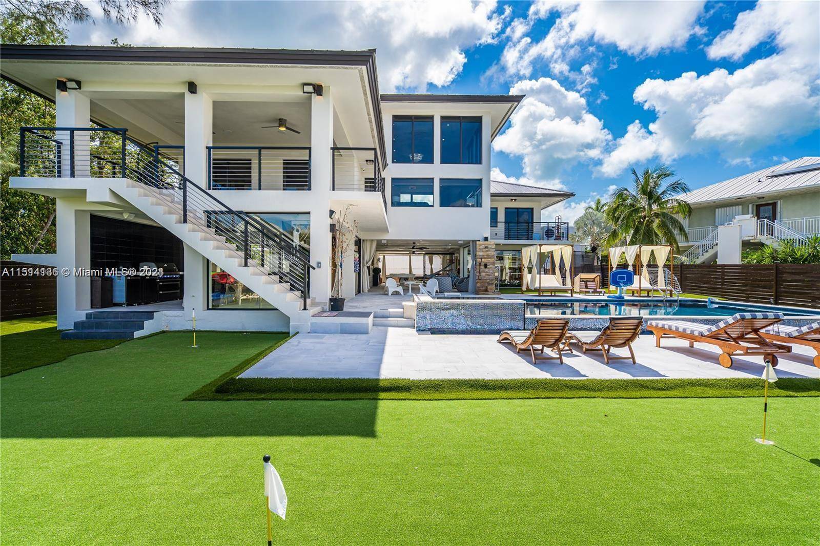 Escape to paradise in this ultra luxe Key Largo home, where every whim is met and serenity reigns.