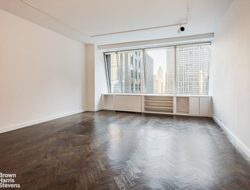 This renovated, 973 square foot one bedroom, 1.