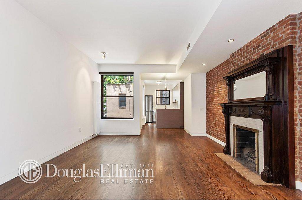 Large, Renovated True 4 Bedroom Duplex Apartment with Private Roofdeck.