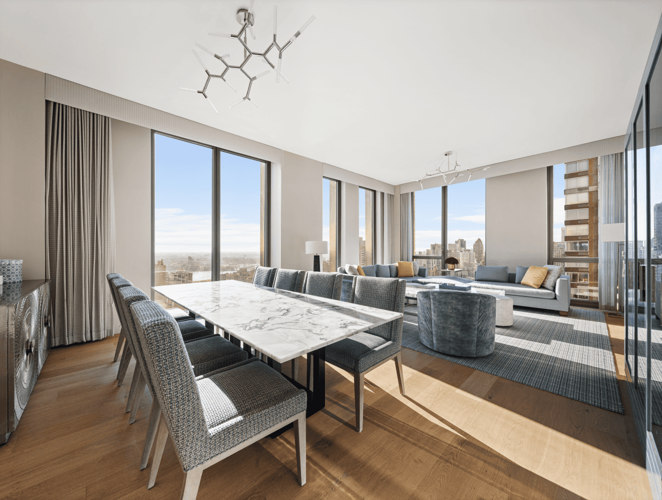 Perched high on the 31st floor, a walnut entry door and a white oak foyer welcome you to this luxurious residence featuring three bedrooms, three baths and a powder room.