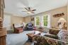 Just a few steps upstairs brings you to the bright generous living room