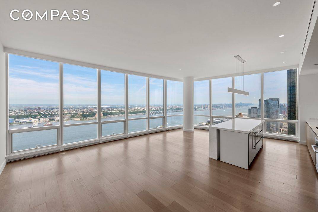 Prized high floor 2 bedroom loft residence with over 11 foot ceilings and Hudson River views !