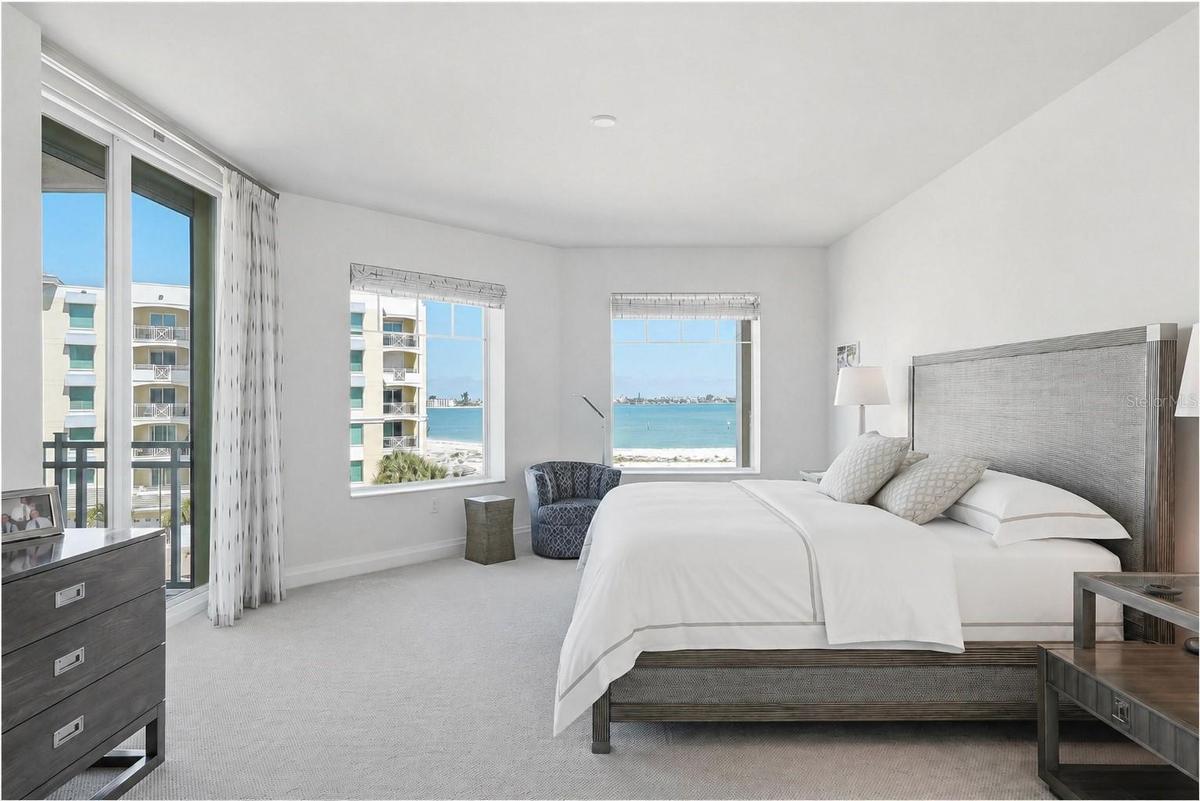 Oversized primary bedroom suite with community, beach and water views!