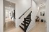 stairs off of office to media room and bedroom #4/workout room
