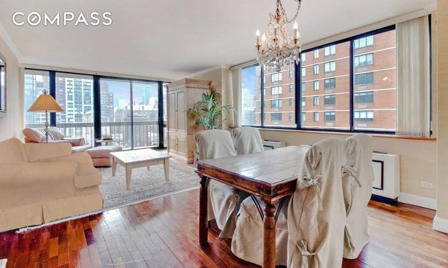 This 17th floor Fully furnished 3 BR 3 Bath home with sizeable balcony features open city views from every room from its three exposures.