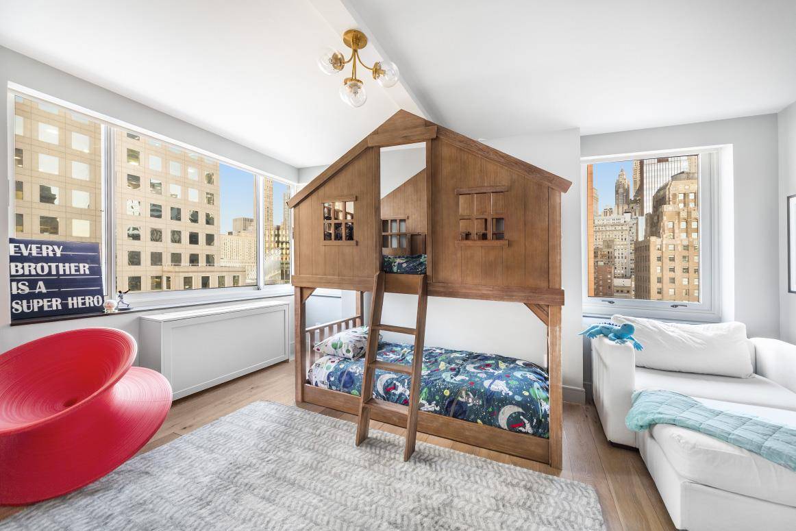 15 PRICE REDUCTIONWelcome to this stunning New York City four bedroom, three and1 2 bathroom home that invites you into a gracious open floor plan encompassing a living, dining, and ...