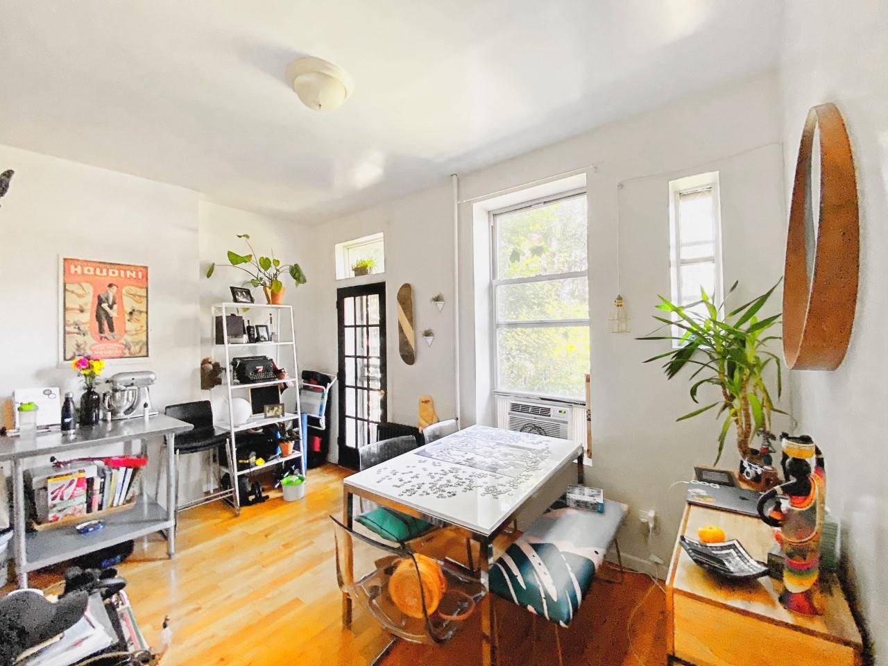 A rare find, Gorgeous One bedroom Duplex with additional room and a beautiful private garden backyard plus laundry in building.
