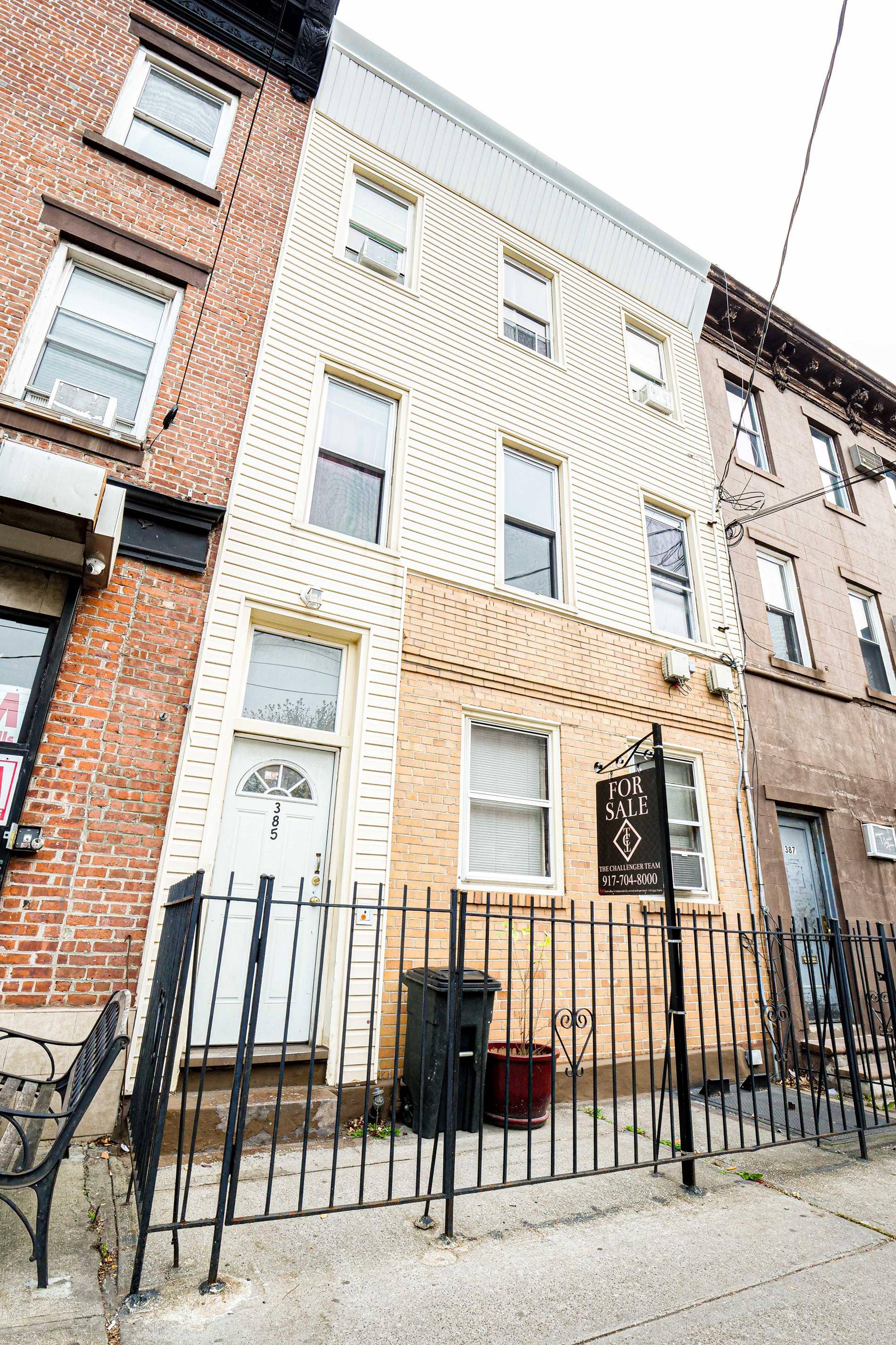 WELCOME TO THIS FULL BRICK 3 FAMILY HOME IS CONVENIENTLY LOCATED A PRIME AREA 0F BEAUTIFUL RED HOOK BROOKLYN.