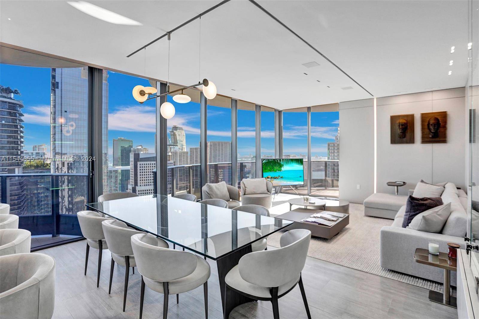 Welcome to this corner penthouse residence, boasting breathtaking views of the city skyline and the bay.