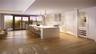 Artist Rendering. Custom frameless contemporary wood cabinetry with full-extension drawer glides, soft-close drawer and doors, complemented by under-c