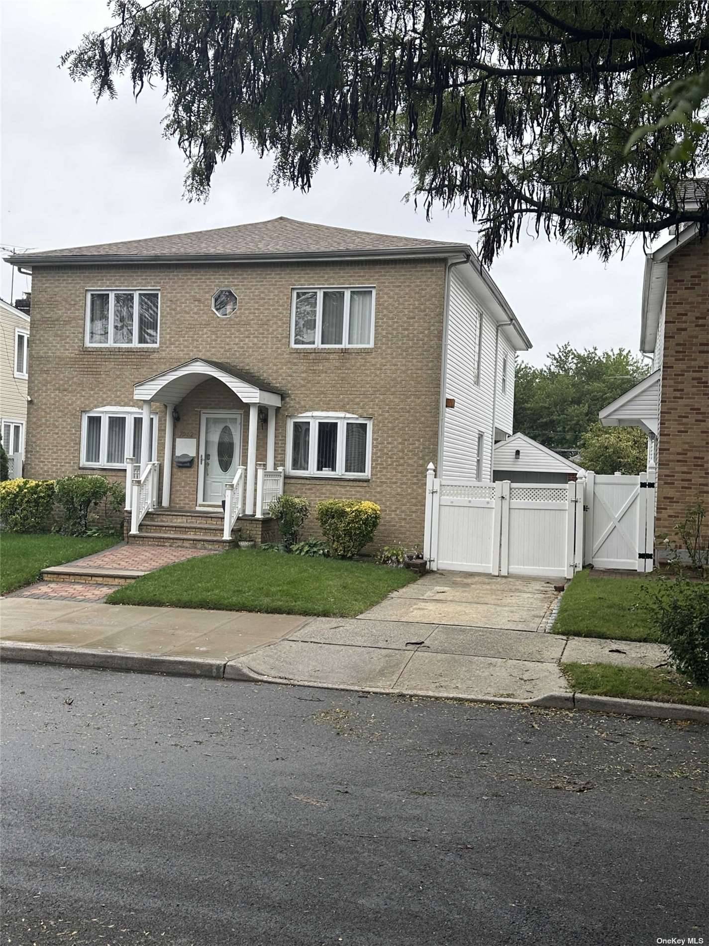 This charming SFR in Glen Oaks, NY was built in 1955 and offers a comfortable and spacious living space.