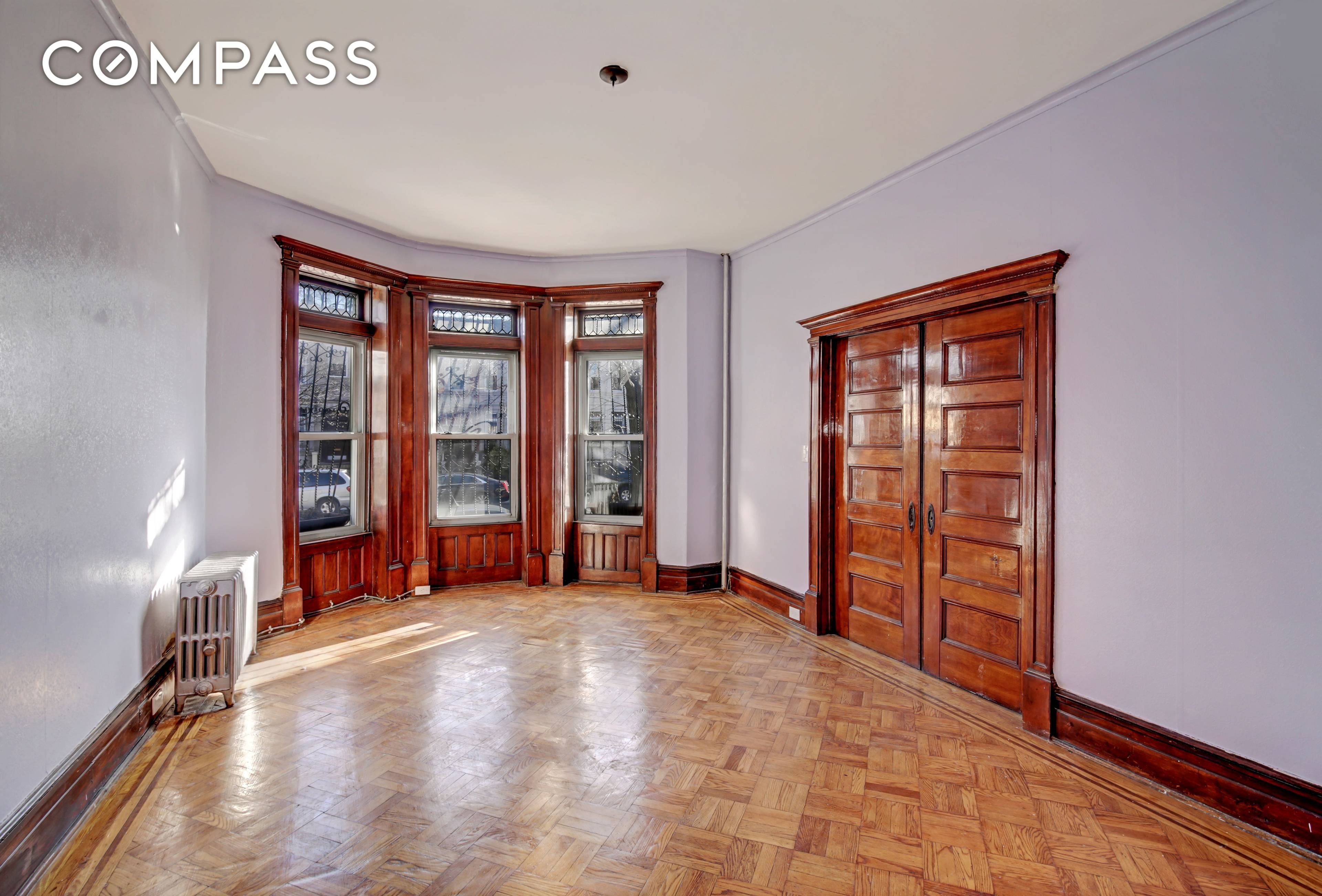 Welcome to 291 Lefferts Avenue 1 The apartment features one large bedroom, a formal dining room, a dressing room, and a shared backyard.